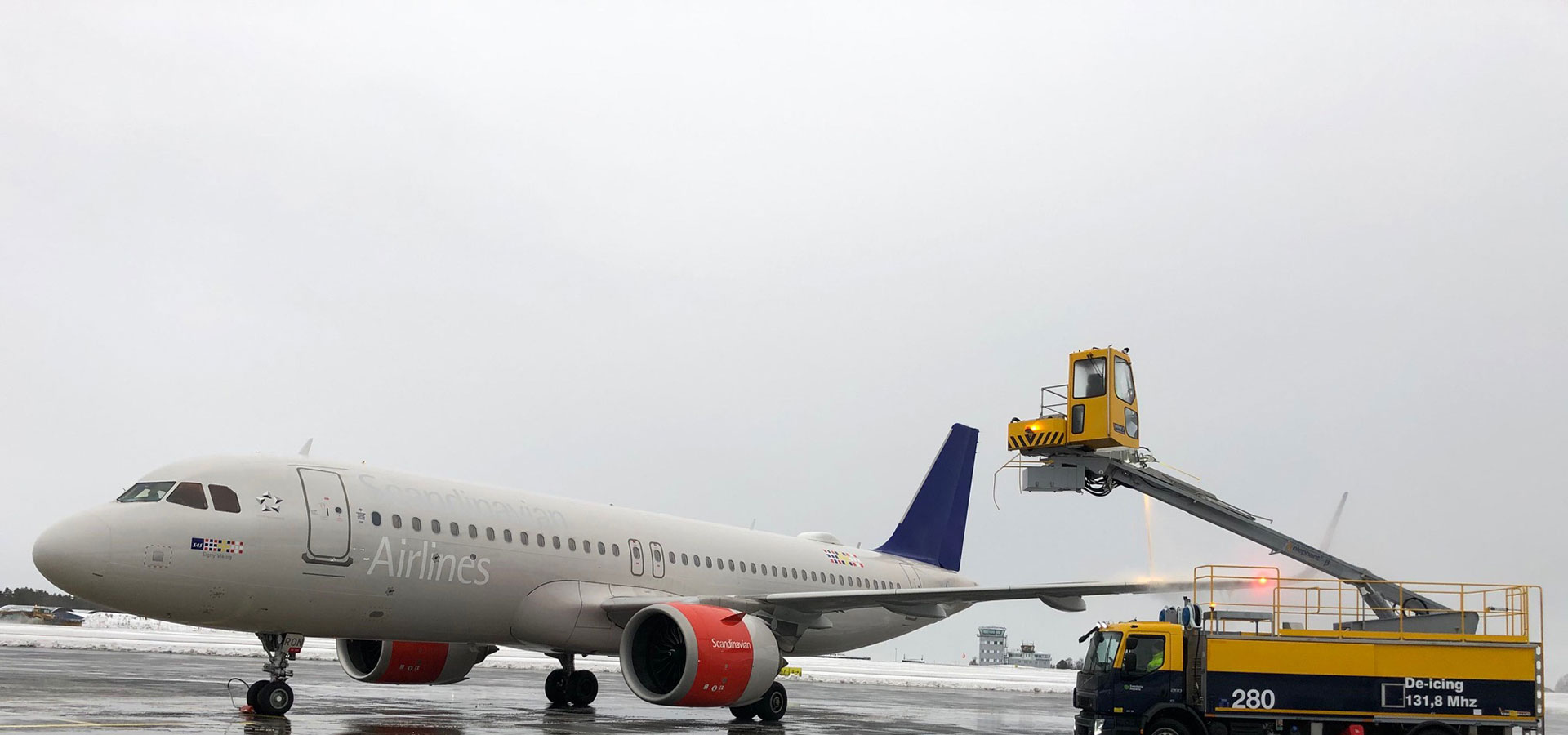 photo of deicing an airplane